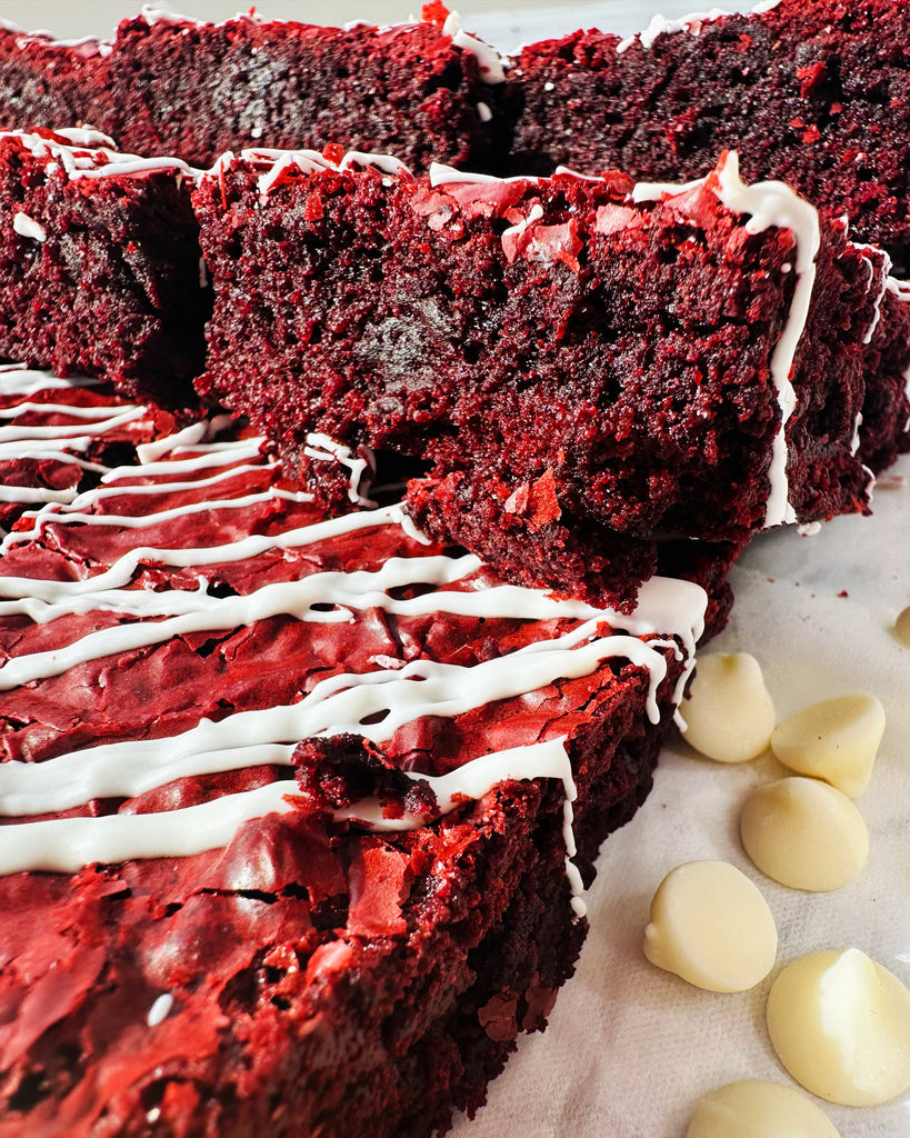 Red velvet brownies with white chocolate drizzle 
